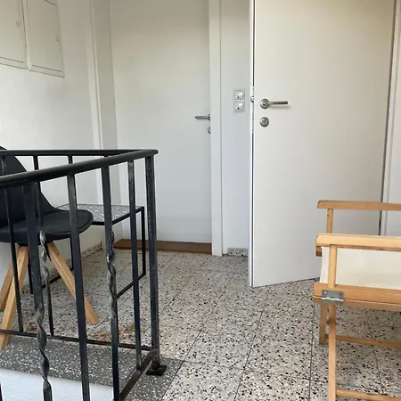 Small Attic Close To And Mountains