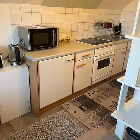 Small Attic Close To And Mountains